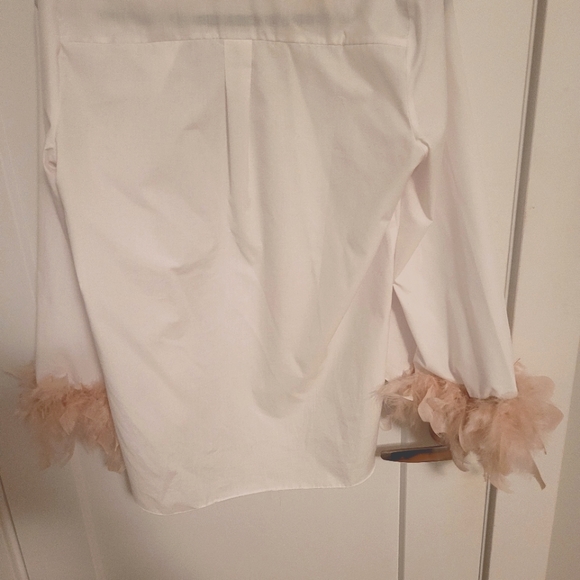 White button down shirt with pink feather cuff detail. - Picture 2 of 3